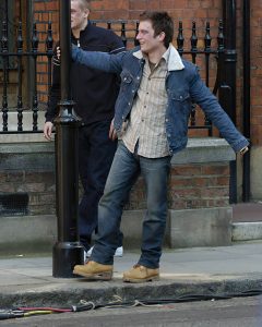 Elijah Wood twirls around a lampost in central London while filming his new movie The Yank with co-star Chris Hunnam. In the movie he plays a recently expelled Harvard student who travels to London and gets embroiled in the passion and excitement of the English football culture.Picture by Martin Grimes<br>  <B>Ref:  MGUK IMUK  310304 A  EXCLUSIVE</B><P><B>Splash News and Pictures</B><br>Los Angeles:310-821-2666<br>New York:212-619-2666<br>London:207-107-2666<br>photodesk@splashnews.com