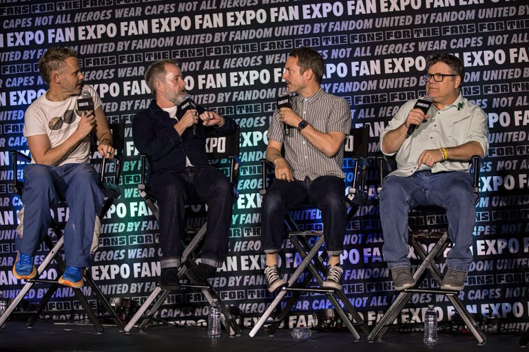 ANAHEIM, CALIFORNIA - JUNE 28: (L-R) Dominic Monaghan, Billy Boyd, Elijah Wood, and Sean Astin speak on stage at An Evening With The Hobbits: In Celebration Of 25 Years panel during Day Three of Fan Expo Anaheim at Anaheim Convention Center on June 28, 2026 in Anaheim, California. (Photo by Daniel Knighton/Getty Images)